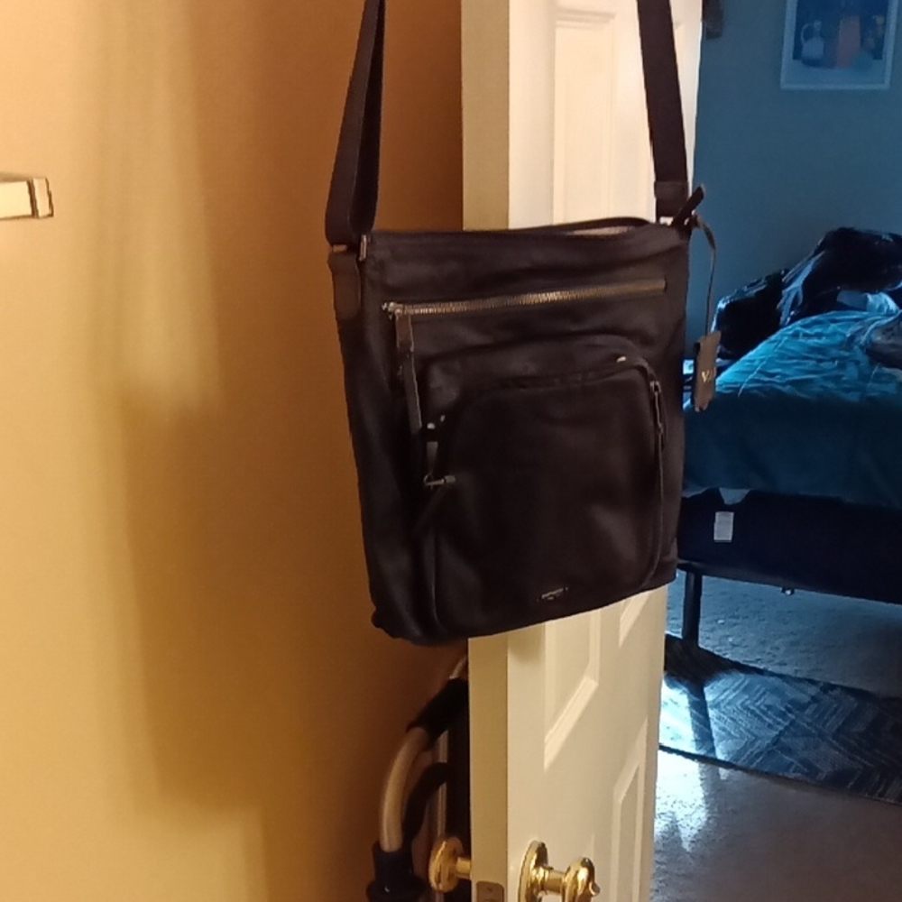 Tumi Black Leather Messenger Bag with Adjustable Strap